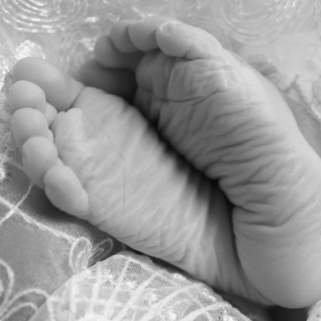 Sadie Amelia's feet. She was stillborn at 32 weeks.